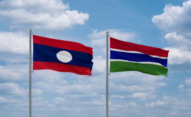 Gambia And Laos Flags Waving