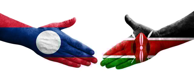 Handshake with Laos and Kenya flags