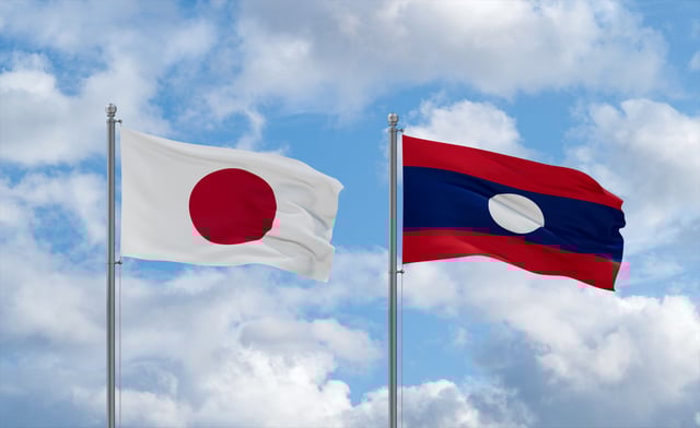 Laos And Japan Flags Waving