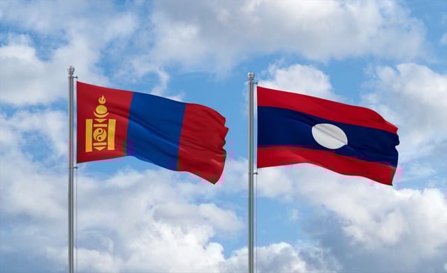 Mongolia And Laos Flags Waving Together In The Wind
