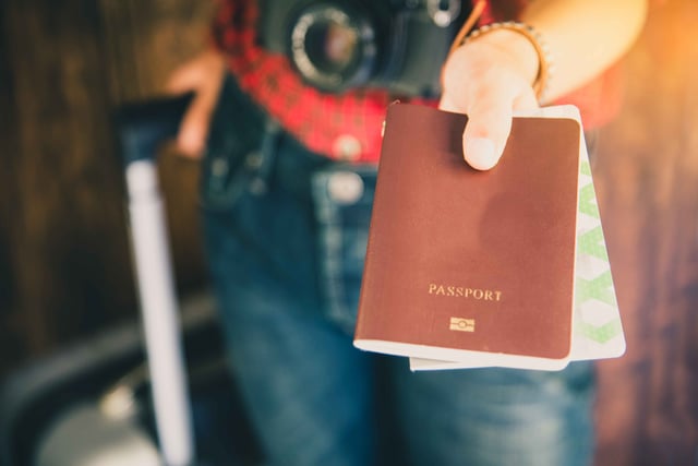 Passengers Hold Passports