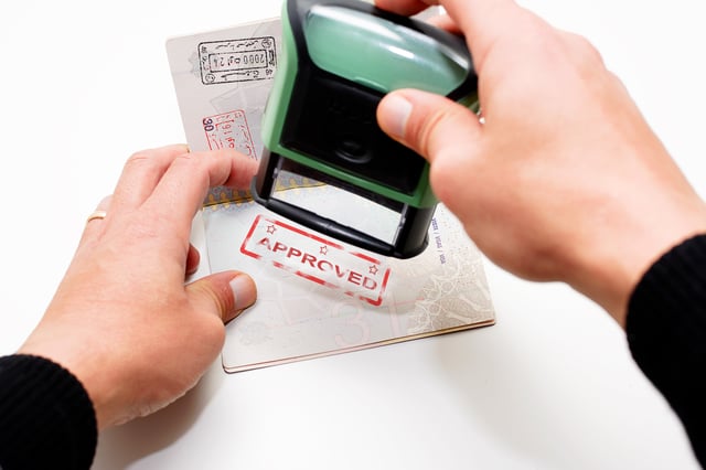 Approved visa stamp on passport