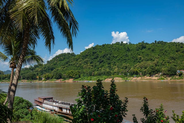 Traditional Long Boat On Mekong River
