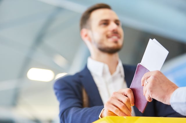 Traveler Shows His Passport