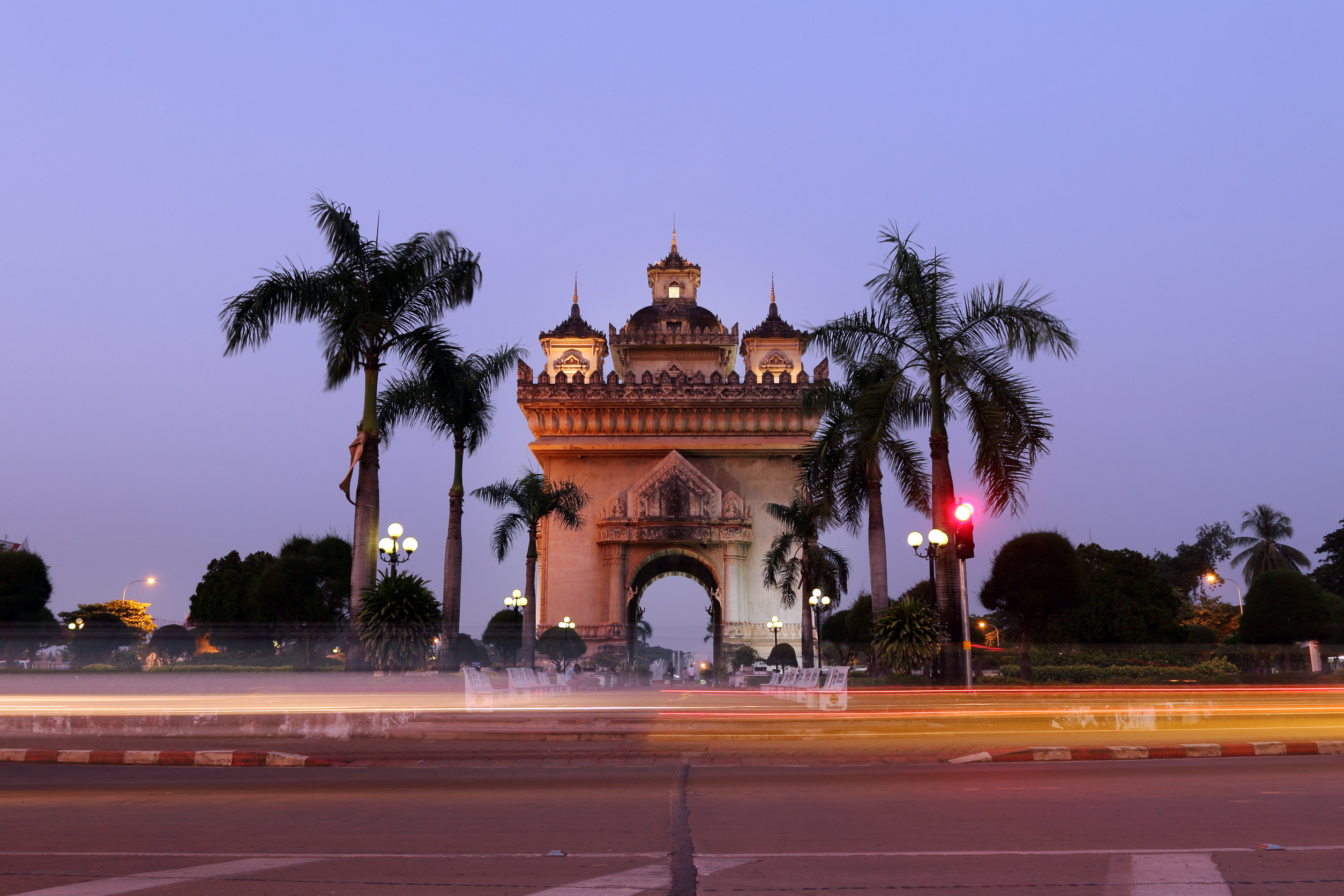 Why should travelers visit laos in the dry season